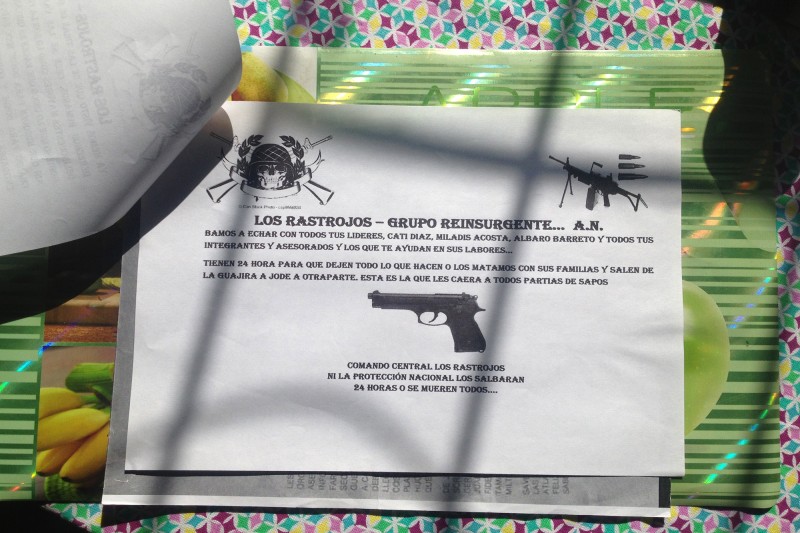 A threat sent to the women of Riohacha by the known armed paramilitary group, Los Rastrojos, who often buy off police to get themselves out of jail after committing crimes ranging in severity. In Riohacha they are notoriously corrupt and demand &quot;vacunas&quot; (taxes) from local businesses &amp;nbsp;and some families in exchange for their &quot;protection.&quot; They fear no government entity. The threat states: &quot;We are going to get rid of all your leaders...[names written out] and everyone involved who helps with your kind of work. You have 24 hours to stop doing everything you do or we will kill you and your families. Leave La Guajira and fuck off to another part; this is what will happen to people like you. You have 24 hours or everyone dies; the state cannot help you.&quot;&amp;nbsp;