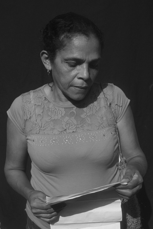 Adaluz Moreno&amp;rsquo;s husband was killed in 1996 in Mam&amp;oacute;n de Maria. After 3 months of mourning she came to El Carmen, but because of system errors she didn&amp;rsquo;t appear as a victim of displacement. Since 1996 the government has sent her three humanitarian aid checks. She&amp;rsquo;s here sorting out the paperwork surrounding the death of her husband.